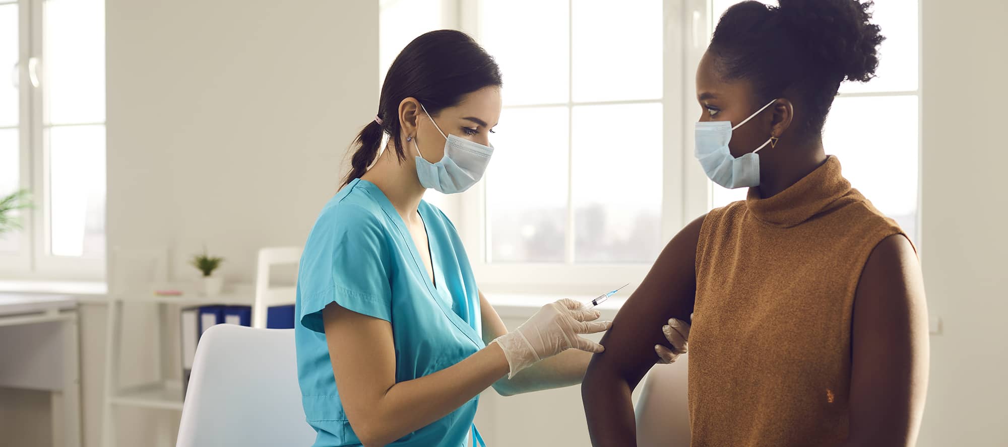 A woman getting a vaccine